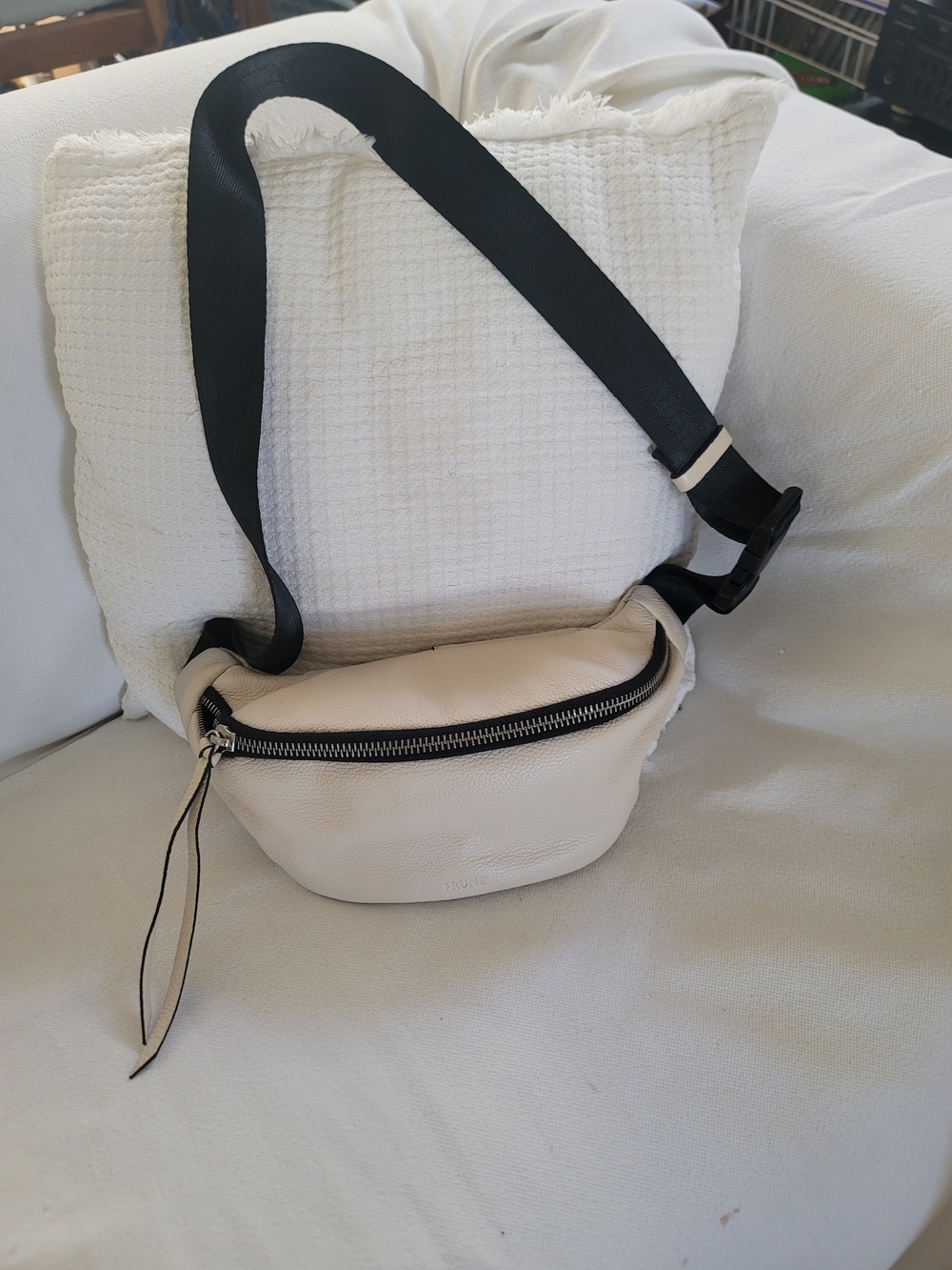 Prüne Women's Cream Pebbled Leather Belt Bag/Cross Body with Black Strap.